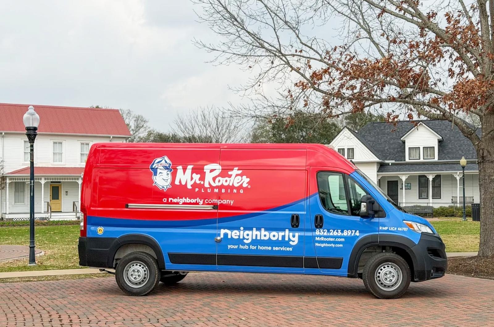 Mr. Rooter Plumbing van parked in a Katy, TX neighborhood